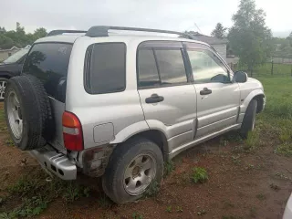 Suzuki Escudo, 1999 года выпуска, регистрационный номер С966КМ125, кузов TD62W101254.