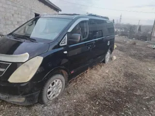 Hyundai Grand Starex, 2009 г.в., госномер Н846ХС154, VIN KMJWAH7JP9U153763, цвет черный (арест, повтор)
