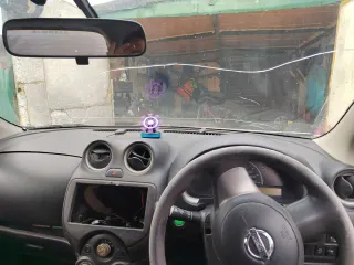 Легковой автомобиль марки Nissan March 2011 г.в., государственный номер К567ОХ28, номер кузова K13336621, находится в совместной собственности с супругой должника.