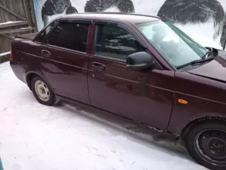 LADA Priora (217030) 2008 года выпуска, VIN: XTA21703080130702. Цвет кузова: Темно-Вишневый. Объем двигателя: 4596 см³, тип: легковой. Пробег: 390817 км. Находится в залоге у ПАО «Совкомбанк».