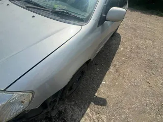 Toyota Corolla 2003 года выпуска, серый цвет. Номер кузова: NZE121-3178012, государственный регистрационный знак: М376ЕТ03. VIN отсутствует.