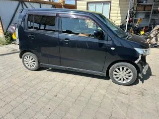 Продажа автомобиля Suzuki Wagon R, 2011 года, черный цвет. ПТС: 25ХВ 060318, госномер: Т060УХ27, кузов: MH23S615346.