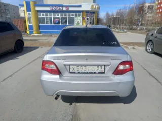 Daewoo Nexia 2009, модель: Нексия, год изготовления: 2009, цвет: перламутрово-серебр