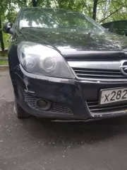 Opel Astra Station Wagon (A-H/SW), черный, госномер Х282АЕ 197, 2010 год, VIN XWF0AHL35A0004272