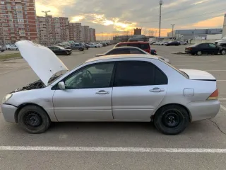 Автомобиль Mitsubishi Lancer, цвет Белый, год выпуска 2004, VIN CS240702698, ГРЗ М976ОЕ123. Все запреты и ограничения с имущества покупатель снимает самостоятельно как новый собственник.