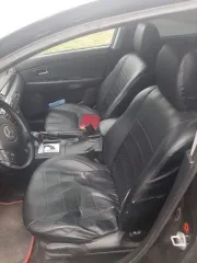 Mazda 3 2005 года выпуска, черный цвет. VIN: JMZBK12Z561296176, госномер: М815АС126. Мощность двигателя 77 л.с. (105 кВт), рабочий объем 1598 куб. см.