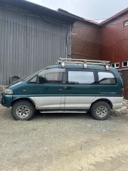 Автомобиль Mitsubishi Delica, 1990 года выпуска, цвет – зеленый, государственный номер А810РС41, номер кузова (прицепа) PE8W0114479, номер двигателя CD6899, мощность двигателя – 125 л.с, объем двигателя – 2476 куб. см. Автомобиль Mitsubishi Delica, 1990 года выпуска, цвет – зеленый, государственный…