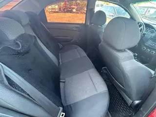 Chevrolet Aveo 2011 года, седан, 101 л.с., пробег 167439 км. Госномер Х779УТ86, цвет красный, VIN XUUSF69W9B0007660, ПТС 86 РТ 916922, СТС 99 76 822033. Требуется замена стоек.