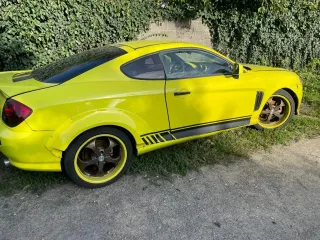 Hyundai Tuscani 2001, VIN: KMHHN61DP1U001496, год выпуска 2001, цвет серый.