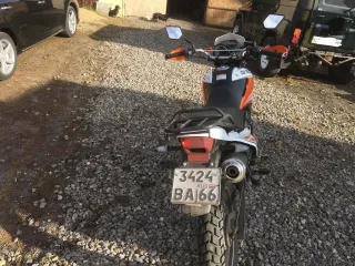 Мотоцикл Racer RC250GY-C2A, 2019 год. VIN: Z9RM35734K0471998. Цвет: оранжевый. Объем двигателя: 224 см³, мощность: 10.8 кВт/14.7 л.с. Экологический класс не установлен. Обездвижен. Многочисленные царапины по кузову, коррозия, замятия кузовных элементов, изношенная резина. Техническое состояние не…