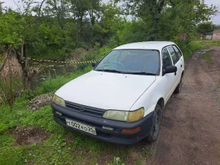 Легковой автомобиль, марка: Toyota, модель: Corolla, год изготовления: 2000, цвет: белый, г/н: Т002КО25 Тех.описание: Машина в России с 2006 года,один хозяин,стекла целые переднее пассажирское не опускается,по кузову есть ржавчина и мелкие вмятинки,печка кондиционер работают,салон нормальный…