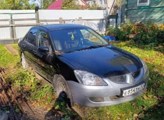 Мицубиси Лансер 2005 года, цвет черный, VIN JMBSNCS3A6U013133, ПТС серия 47РК №321184