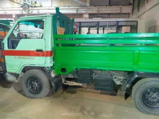 Toyota Dyna 1990 года выпуска, грузовой бортовой автомобиль. Государственный номер А078МЕ79, идентификационный номер (VIN) отсутствует, номер двигателя 0947193, номер шасси (рамы) YU600019503, цвет зеленый. Регистрационный номер 731/А. Снижение цены на 15%.