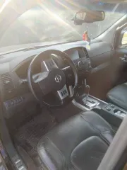 Nissan Pathfinder 2012 года, универсал. Дизельный двигатель 190 л.с., цвет серо-сиреневый, VIN: Z8NJVWR51CS000651. На ходу. Пробег 232 220 км. Недостатки: вмятина на правом переднем крыле, замят левый порог, есть царапины и сколы на кузове.