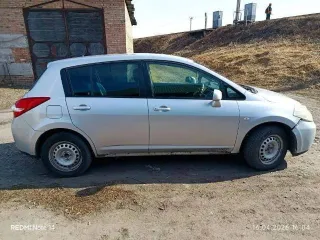 Nissan Tiida 2009 года, 109 лс, 450000 км, АКПП. Транспортное средство: NISSAN TIIDA, 2009 г.в., VIN отсутствует, цвет серый, номер кузова C11309798, номер двигателя HR15-207041B.
