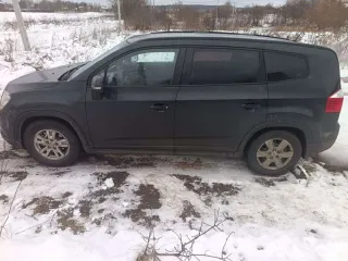 Chevrolet Orlando 2014 Легковой автомобиль ШЕВРОЛЕ ОRLANDO VIN: XUUYF755JE0002251 Год выпуска: 2014 Кузов: XUUYF755JE0002251 Цвет: Черный Тип двигателя: Бензиновый Мощность двигателя: 141 л.с. 102,7 кВт Рабочий объем двигателя: 1798 куб. см ПТС 50 РР 679540 СТС 99 65 № 931401 Вид права…