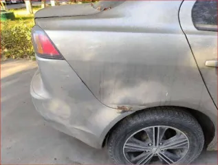 Mitsubishi Lancer 2011 Легковой седан Mitsubishi Lancer 1,5, VIN: JMB5NCY2ABU006835, год выпуска: 2011, цвет: бежевый, тип двигателя: бензиновый, мощность двигателя: 109 л.с. (80,2 кВт), объем двигателя: 1499 куб.см., экологический класс: четвертый. По периметру автомобиля наблюдаются очаги…