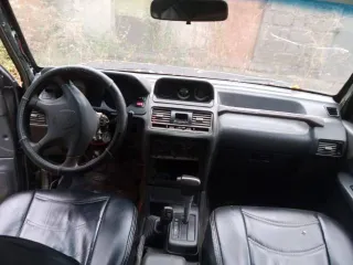 Mitsubishi Pajero 1998 года, 145 л.с., полный привод, АКПП. Цвет зеленый. VIN: JMY0RV430WJ002037, ПТС: 46РА927252, госномер М841УХ32. Производитель Япония. Модель двигателя 6G72, бензиновый, объем 2972 куб. см, мощность 147 л.с. Разрешенная максимальная масса 2405 кг, масса без нагрузки 1795 кг.