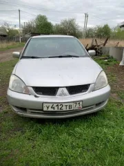 Мицубиси лансер 1,6 2003 года, VIN JMBSRCS3A4U002962.