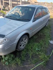 Mazda Familia 2001 года выпуска, идентификационный номер (VIN) отсутствует, номер кузова NBJ5W306594.