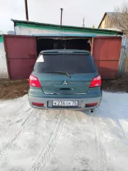 Автомобиль марки Mitsubishi модель Outlander, VIN: JMBXNCU2W5U000983, год выпуска 2004.