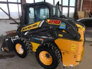 New Holland L218, 2016 Мини погрузчик NEW HOLLAND L218, 2016 года еще Мини погрузчик NEW HOLLAND L218, 2016 г.в., зав№ JAF0L218VGM422833, № дигателя 123520, ГРЗ 9869 УН 86.