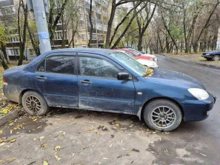 Mitsubishi Lancer, 2006 года, 82 лс, 150000 км. Легковой автомобиль, марка: Мицубиси, модель: Лансер 1.3. VIN: JMBSNCS1A7U001789, год изготовления: 2006, цвет: синий, ПТС: 77 ОН 475885, Г/Н: К746РН177, изготовитель (страна): Япония, тип двигателя: бензиновый, мощность: 82 л. с. (60 кВт), рабочий…