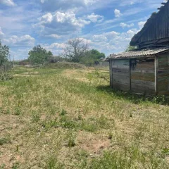 ¼ доли земельного участка площадью 616,0 кв.м и ¼ доли жилого здания площадью 36,5 кв.м, кадастровый номер по адресу: Ростовская область, р-н Усть-Донецкий, ст. Мелиховская, пер. 14, д. 7, кв. 2