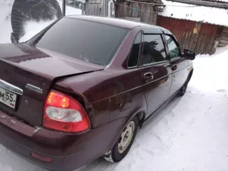 LADA Priora (217030) 2008 года выпуска, VIN: XTA21703080130702. Цвет кузова: Темно-Вишневый. Объем двигателя: 4596 см³, тип: легковой. Пробег: 390817 км. Находится в залоге у ПАО «Совкомбанк».