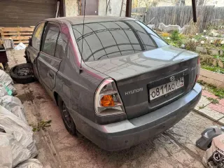 Hyundai Accent 2004, VIN: X7MCF41GP4M013070, год выпуска 2004, цвет серый. Автомобиль находится в залоге у КПК Кубик, в аварийном состоянии (сильно поврежден после серьезного ДТП, технические части не рабочие, повреждения затрагивают ключевые узлы и агрегаты, а также силовую структуру кузова…