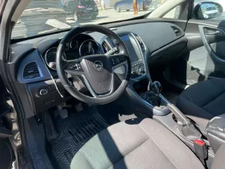 Opel Astra 2012 черный, идентификационный номер XWFPD2DC1C0020798, государственный регистрационный знак Н934УР86