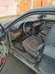 Audi 100 1991 года выпуска, VIN WAUZZZ4ZMN028972. Цвет кузова черный, механическая коробка передач.