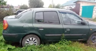 Renault Symbol EX14 2002 года выпуска. Седан зеленого цвета. VIN: VF1LB03C527537786. ПТС: 54 ОС 873711. Государственный номер: В763КТ122. Модель двигателя: K7JA700, бензиновый, номер R153553. Мощность 75 л.с. (55 кВт), объем 1390 куб. см. Разрешенная максимальная масса 1460 кг, масса без нагрузки…