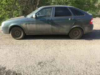 Lada Priora 2012 года, цвет Серо-Синий-Зеленый. VIN: XTA217230C0204057, ПТС: 63НМ940185, номер Р162ОА163. Двигатель 97.9 л.с. (72.0 кВт), объем 1596 куб.см.