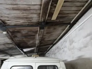 Земельный участок 2650 кв.м с постройками Котлас, кадастровый номер 29:24:010204:82 с расположенными на нем объектами недвижимого имущества: здание гаража котласской поликлиники, кадастровый номер 29:24:010204:210, здание склада котласской поликлиники, кадастровый номер 29:24:010204:209; здание…