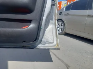 Daewoo Nexia 2009, модель: Нексия, год изготовления: 2009, цвет: перламутрово-серебр