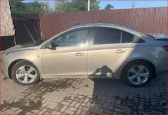 Шевроле Круз 2010 года, VIN XUFJA695JA3016941, госномер К319КХ761.