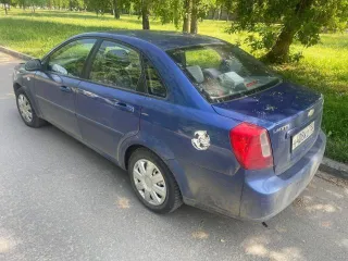 Chevrolet Lacetti 2009 года выпуска, синий цвет. VIN: XUUNA196J9C001296.