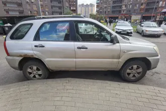 KIA Sportage 2009 года выпуска, VIN XWEKG812AA0001237.