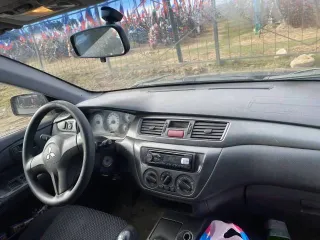Mitsubishi Lancer 2006 года, 98 лс, 215000 км. Легковой автомобиль, марка: MITSUBISHI, модель: LANCER, год изготовления: 2006, VIN: JMBSNCS3A7U004378, г/н: К608УО69, общее имущество супругов.