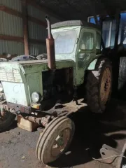 Трактор Т-40 АМ 1990 года выпуска, зеленого цвета. Номер двигателя: 2750843. Номер коробки передач: 1211940. Заводской номер машины (рамы): 357498. Государственный регистрационный номер: 43 КХ 7617.