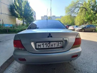 Mitsubishi Lancer 2004 года, 98 л.с., пробег 250000 км, АКПП. Транспортное средство Mitsubishi Lancer 1.6, 2004 года выпуска, регистрационный номер М110НТ21, VIN JMBSRCS3A5U006276.