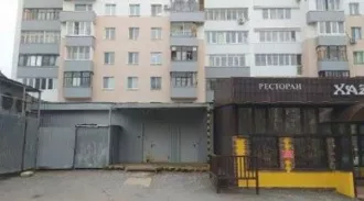 Нежилые помещения первого этажа и подвала, встроенно-пристроенных к девятиэтажному жилому зданию  (кадастровые номера 02:55:020215:1277, 02:55:020215:1278), расположенного по адресу: Республика Башкортостан, г. Уфа, Орджоникидзевский район, ул. Чудинова, д. 1 Объект муниципального нежилого фонда -…