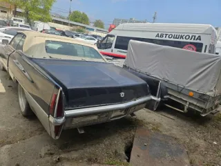 Автомобиль марки Cadillac Coupe Deville, 1970 г.в., VIN FO289501, цвет черный, тип кузова: 2-х дверный седан-coupe. Цена 2 422 330 руб., задаток 363 350 руб., шаг аукциона 24 224 руб. Вид транспорта: легковой.