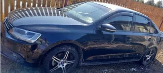 Автомобиль легковой, марка: Volkswagen, модель: Jetta, VIN: WVWZZZ16ZCM077118, гос. рег. номер: О911УЕ70, год изготовления: 2011