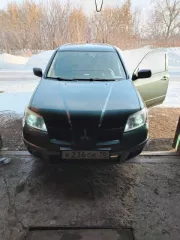 Автомобиль марки Mitsubishi модель Outlander, VIN: JMBXNCU2W5U000983, год выпуска 2004.