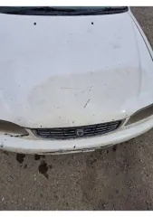 Toyota Corolla 2000 года, 100 л.с., пробег 370000 км, АКПП. Регистрационный номер А023УВ42, номер двигателя AE1105366976. Автомобиль на ходу. Техническое состояние: ходовая гремит, задние стойки полностью не работают, не работает АБС. Внешне автомобиль находится в плохом техническом состоянии…