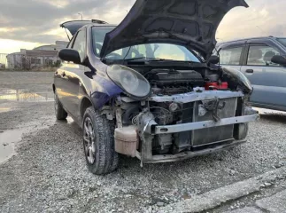 Автомобиль Nissan March, год выпуска 2002, VIN AK12031344, цвет кузова сиреневый.