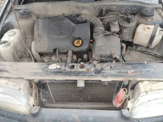 ВАЗ 2114, 2007 года, черный, 1.6 л (81 л.с.), пробег 300000 км. VIN: XTA21144074457740. Двигатель и коробка передач в хорошем рабочем состоянии. Требует ремонта: отсутствует аккумулятор, имеются сколы, царапины и очаги сквозной коррозии на крыльях, порогах и дверях. Возможны другие скрытые…