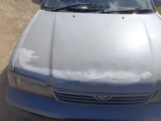 Toyota Tercel 1998 года, 82 л.с., пробег 470048 км. Цвет серебристый. ПТС 65673907, госномер М143АН65. Изготовитель Япония, тип двигателя бензиновый. Кузов № EL510237306, разрешенная максимальная масса 1215 кг, масса без нагрузки 940 кг.